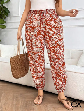 Calça Feminina Estilo Harém com Estampa Tropical e Cintura Franzida Aranza. Plus Size