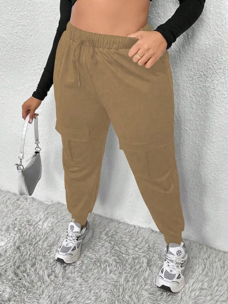 Calça Jogger Feminina Com Bolsos E Cintura Alta Miranda. Plus Size