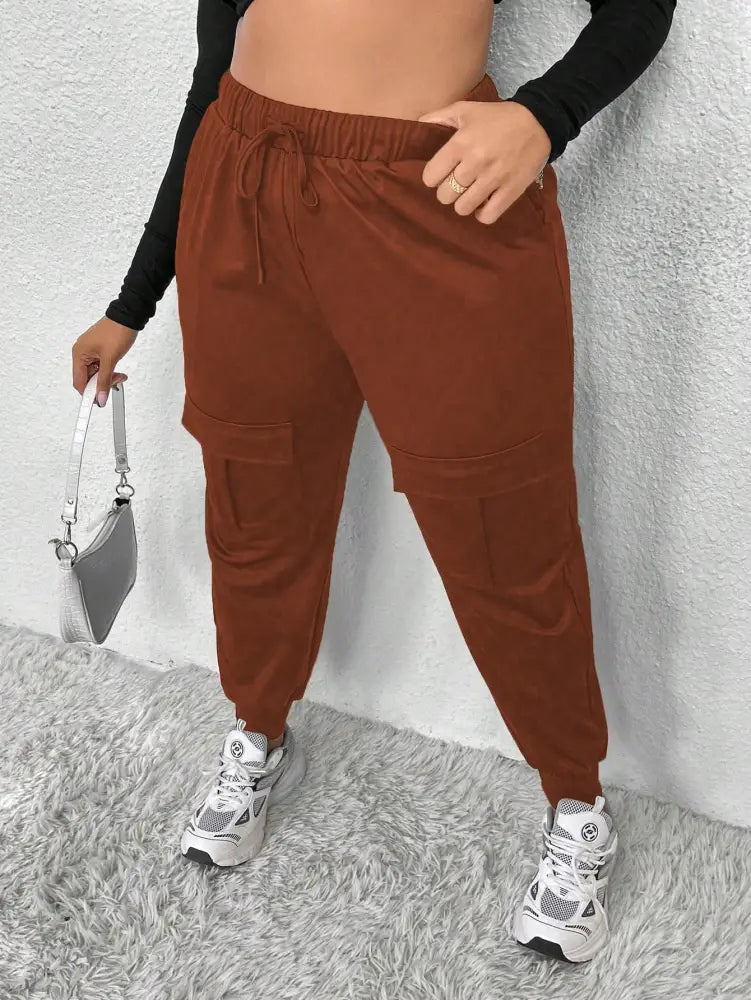 Calça Jogger Feminina Com Bolsos E Cintura Alta Miranda. Plus Size