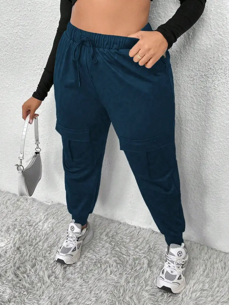 Calça Jogger Feminina Com Bolsos E Cintura Alta Miranda. Plus Size