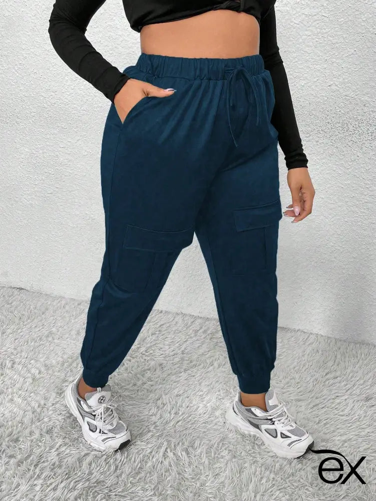 Calça Jogger Feminina com Bolsos e Cintura Alta Miranda. Plus Size